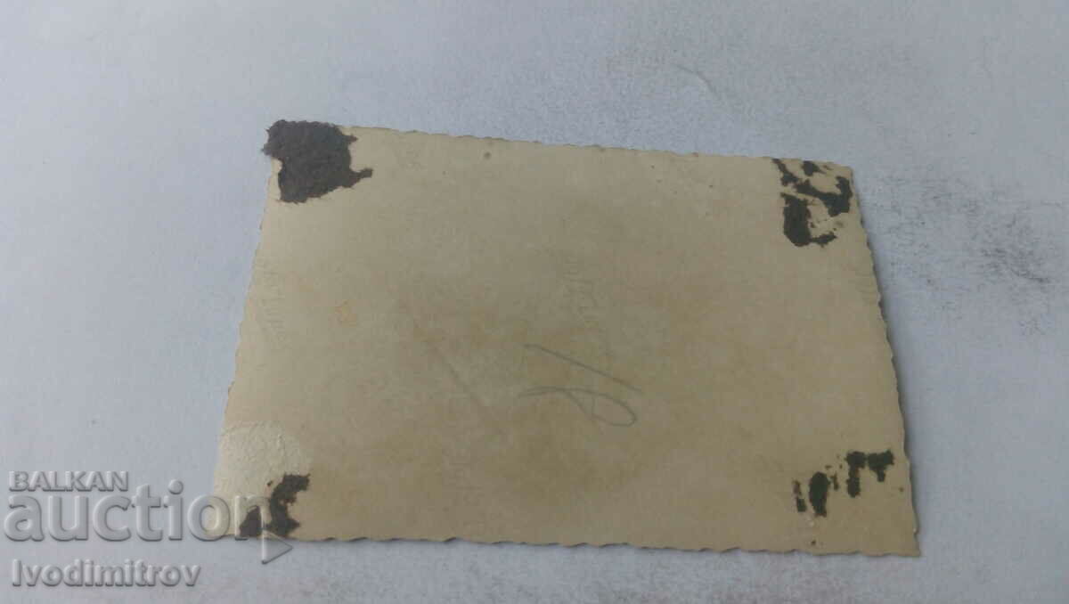 Photo Men and women and children next to a retro car with price 1.65 BGN | € 0.84 Photo Men and women and children next to a retro car with price 1.65 BGN | € 0.84