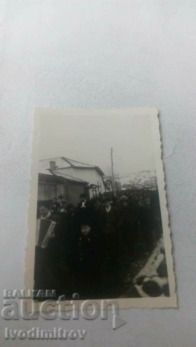Photo Procession on a street in the village