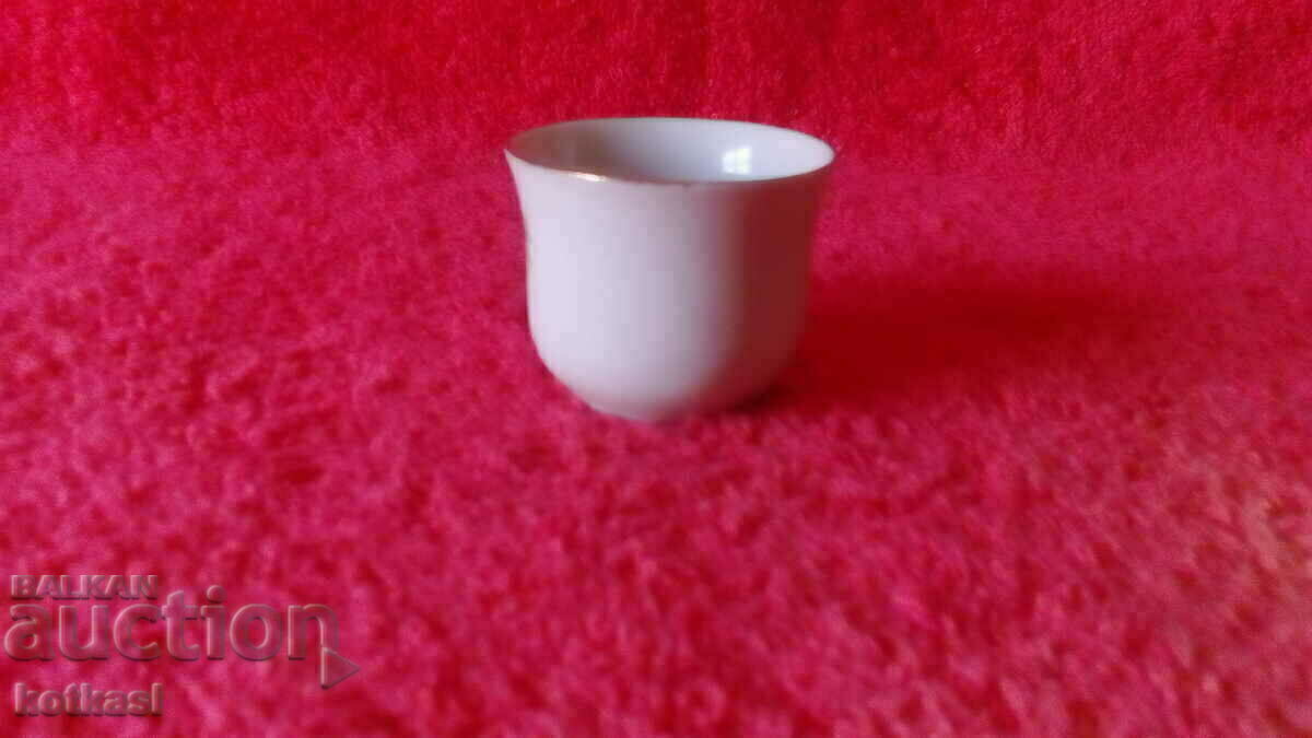 Auction Old small porcelain cup with gold edging Auction Old small porcelain cup with gold edging