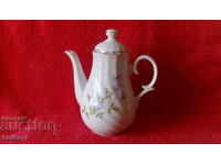 Old social porcelain jug marked with gold edging