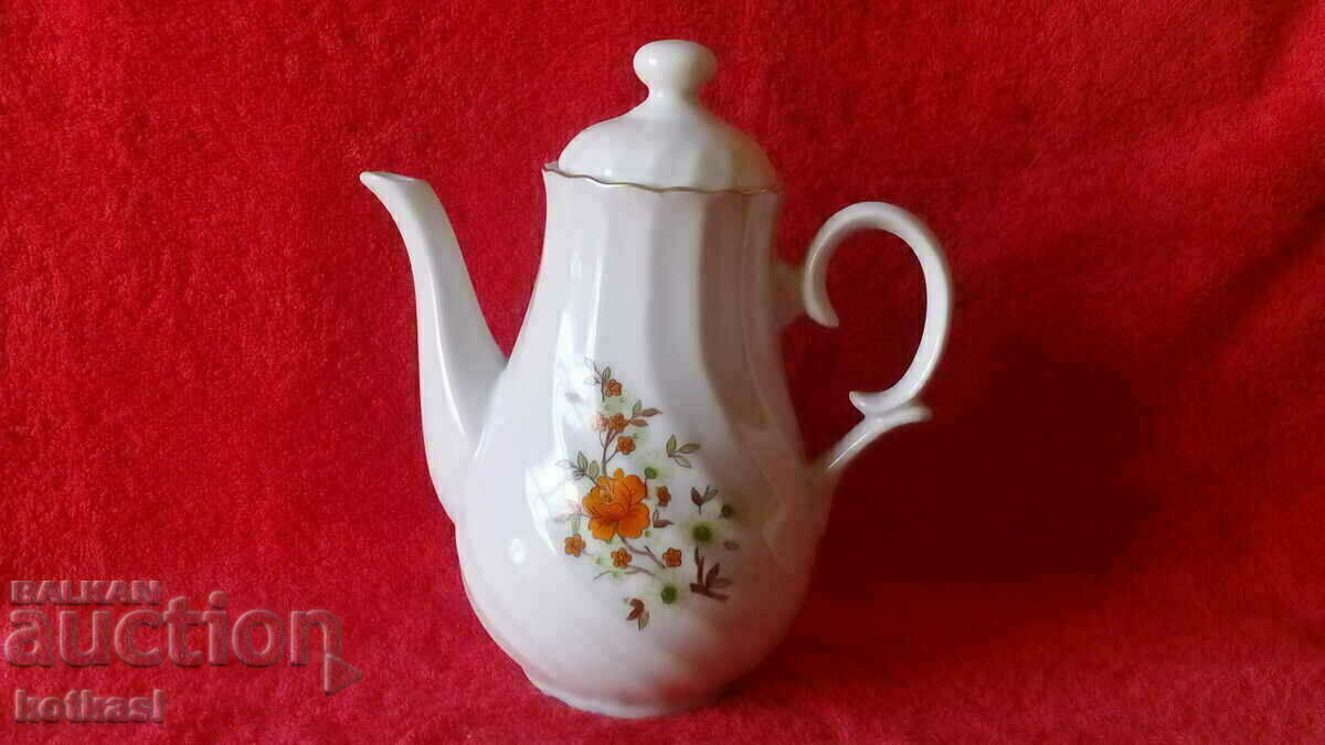 Old social porcelain jug marked with gold edging