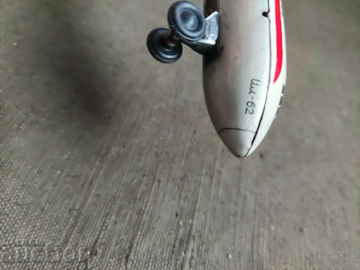 The tin toy plane IL-62 - 7 The tin toy plane IL-62 - 7