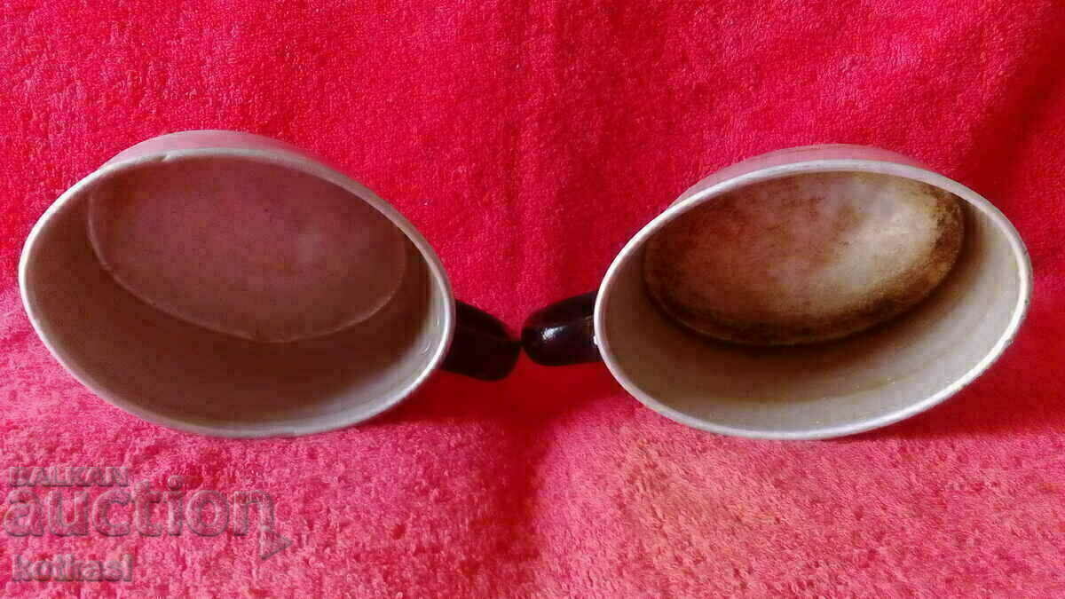Auction  Lot of two old aluminum vessels, jugs