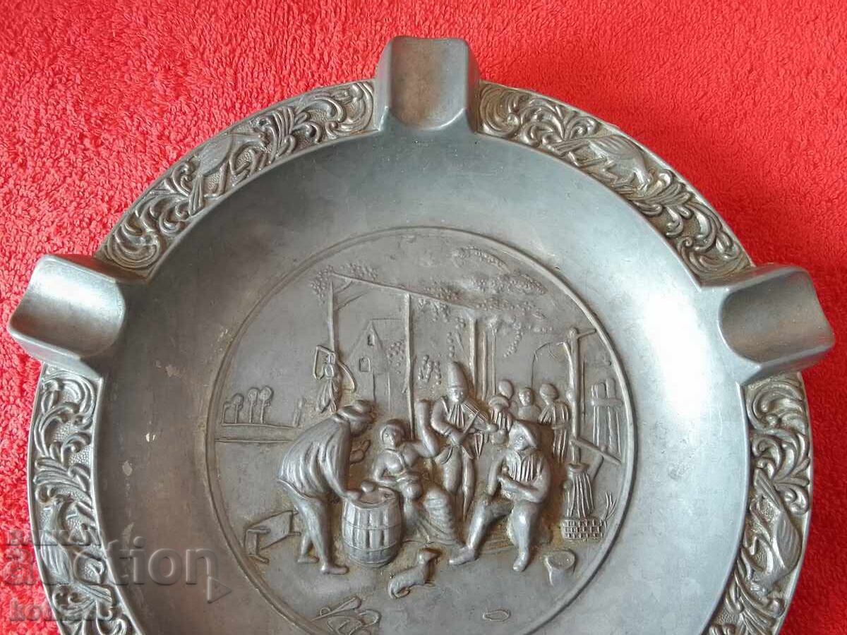 Auction  Large, massive metal ashtray for cigars and cigarettes, panoramic