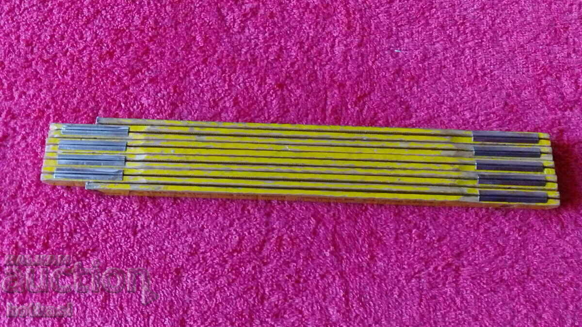 Auction  Wooden folding two meters Meter master