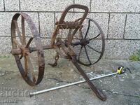 SOLID LARGE RENAISSANCE WROUGHT WHEELER FOR PLOW, PLOW