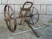 SOLID LARGE RENAISSANCE WROUGHT WHEELER FOR PLOW, PLOW