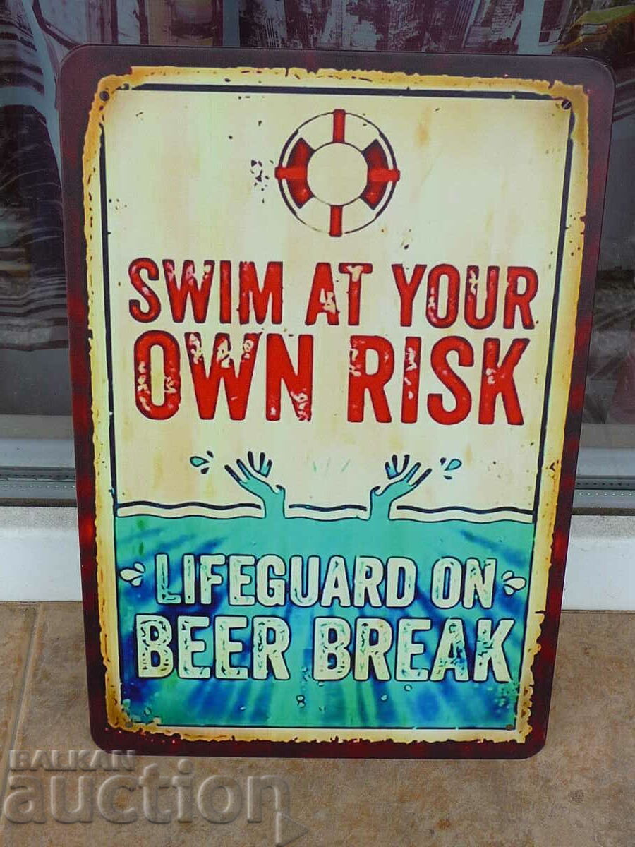 Metal plate inscription Swim at risk lifeguard drinks beer
