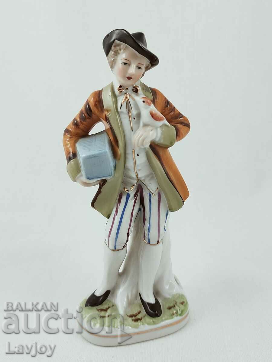 Old porcelain figurine of a gentleman