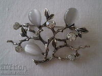 Beautiful craftsmanship and quality of crystal and mother-of-pearl brooch