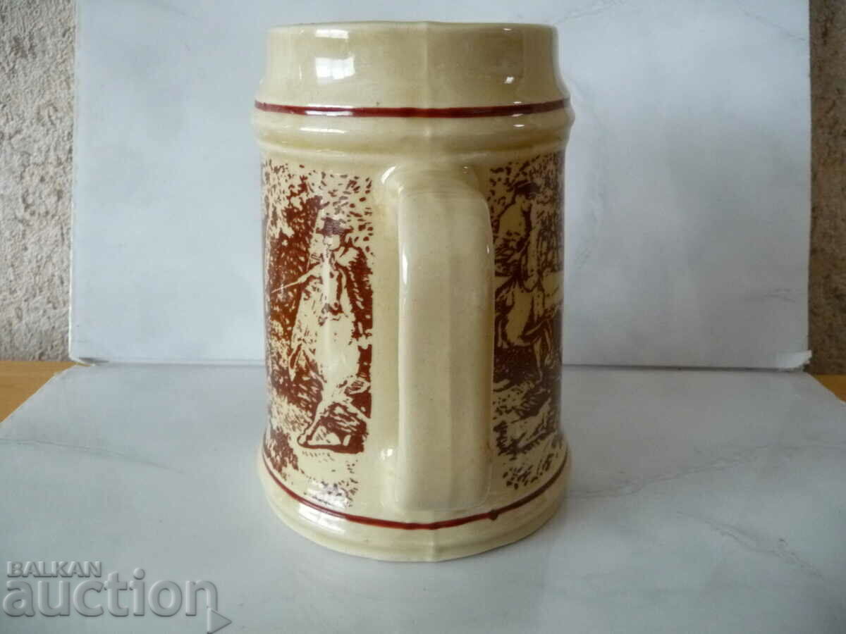 Delivery of Old ceramic beer mug with Bulgarian deer hunting motifs Delivery of Old ceramic beer mug with Bulgarian deer hunting motifs