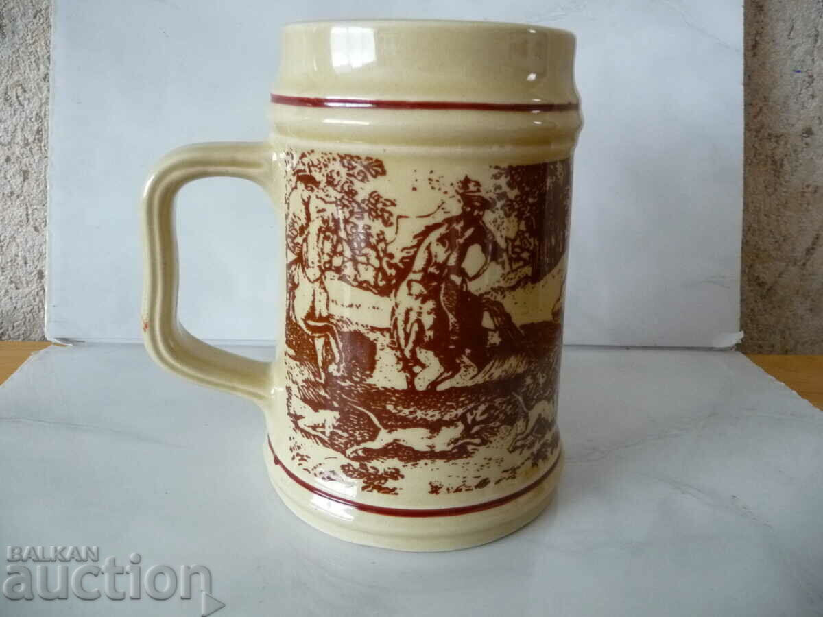 Old ceramic beer mug with Bulgarian deer hunting motifs