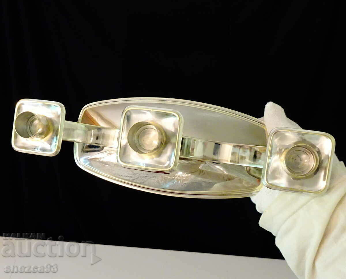 Delivery of Silver-plated candlestick for three candles, triple candlestick.