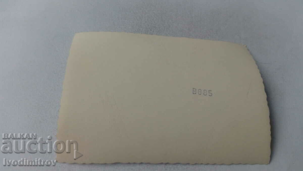 Photo Men and woman in front of a railway carriage with price 1.45 BGN | € 0.74