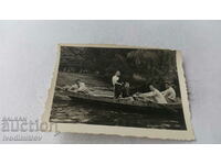 Picture Five youths in a boat