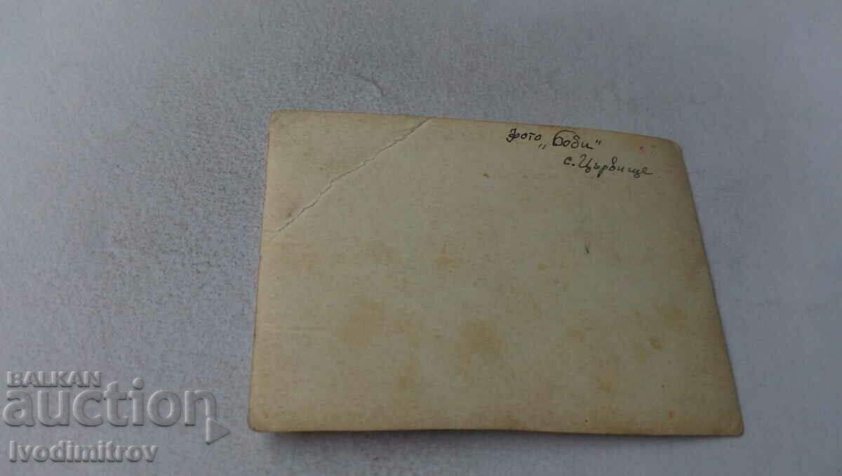 Photo village Tsarkvishte Two young men and two girls on the grass with price 1.65 BGN | € 0.84