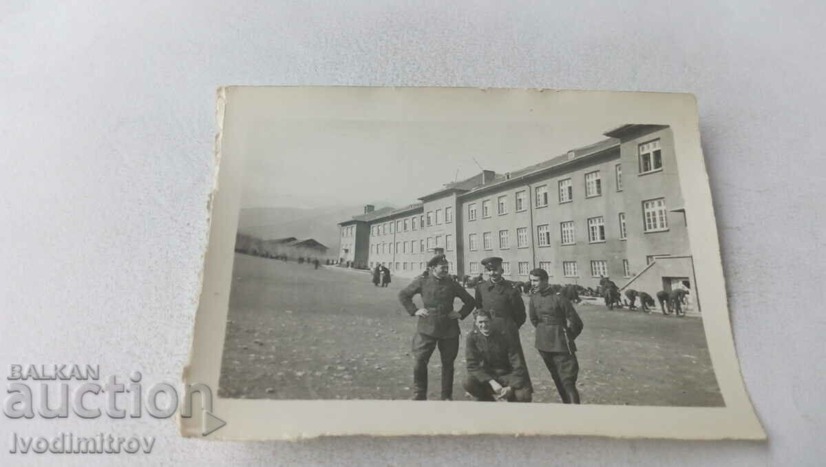 Photo Four sergeants in the barracks