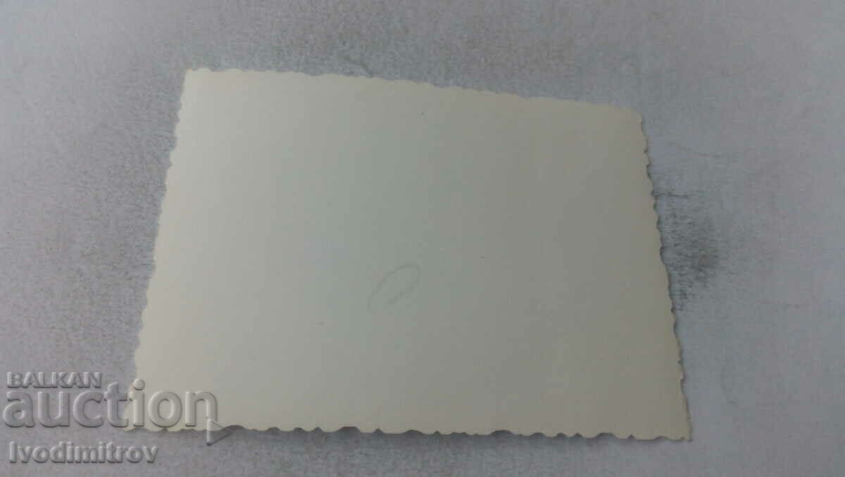 Photo Man next to a water tap with price 1.35 BGN | € 0.69 Photo Man next to a water tap with price 1.35 BGN | € 0.69