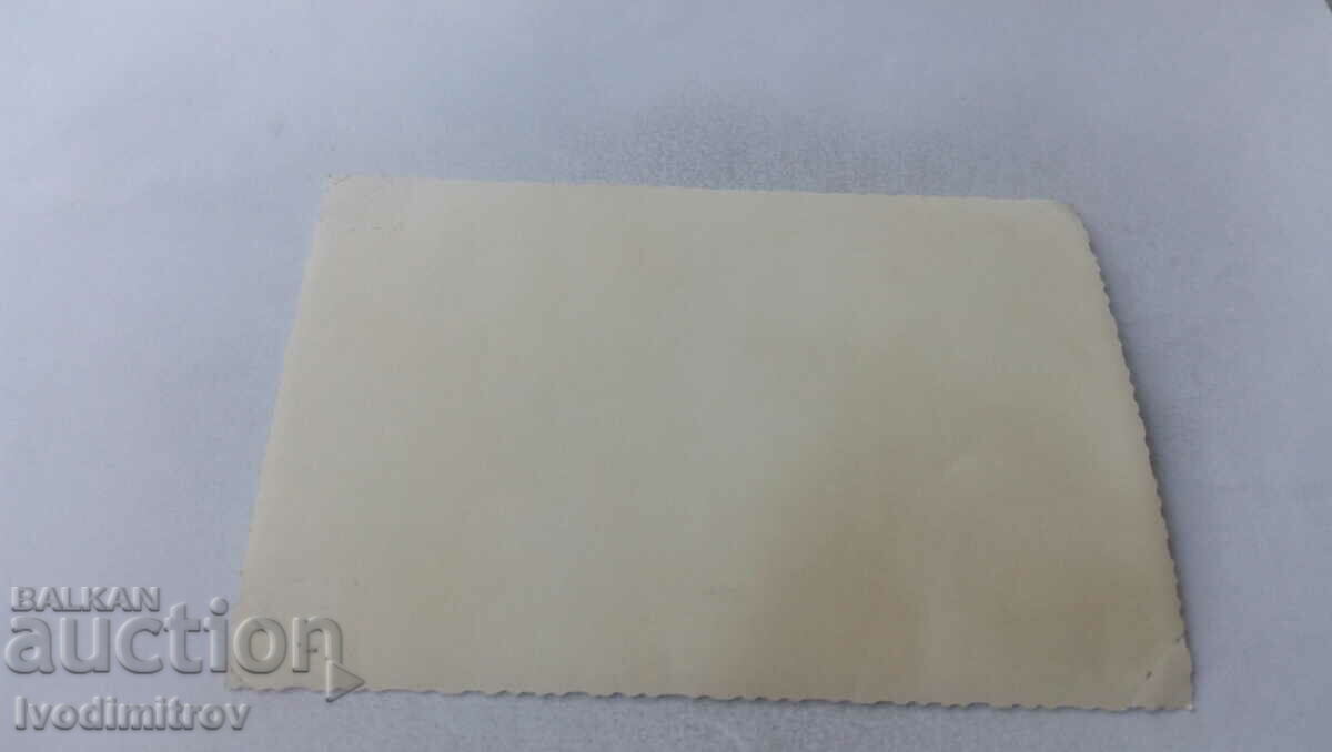 Photo Officer men women and children in front of a house in winter with price 1.35 BGN | € 0.69