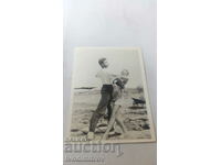 Fotografie Un tânăr și o fată într-o ipostază de vals