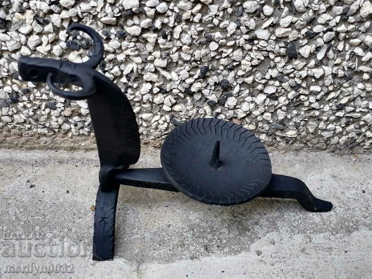 Auction An old candle made of wrought iron lamp Auction An old candle made of wrought iron lamp