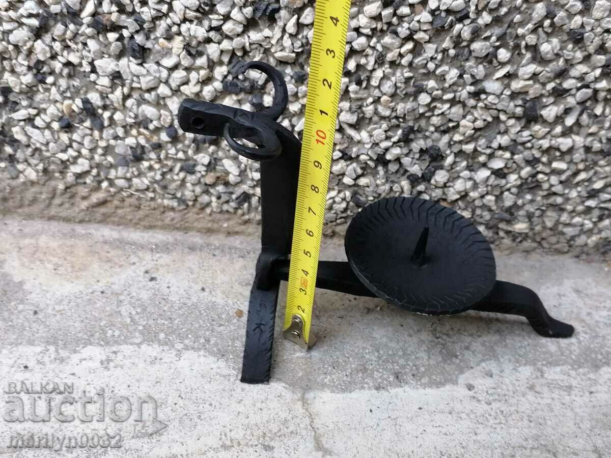 Delivery of An old candle made of wrought iron lamp Delivery of An old candle made of wrought iron lamp