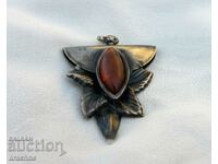Large silver pendant with amber