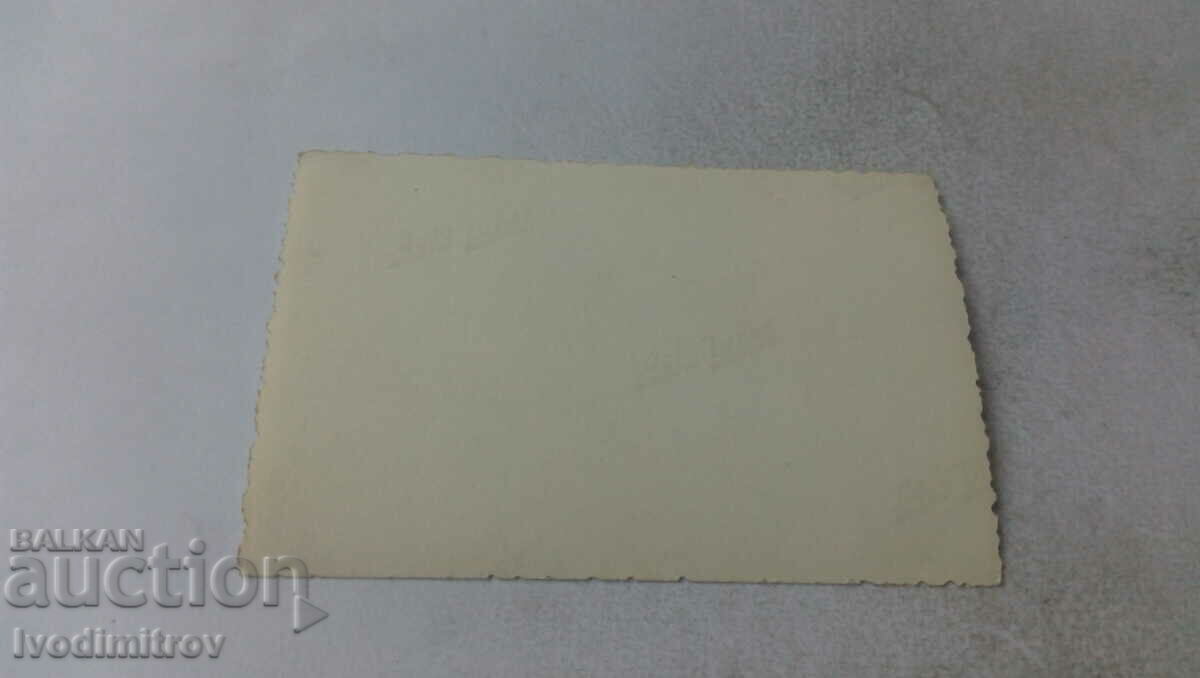 Photo A young man and four women on a bench in the yard with price 1.15 BGN | € 0.59 Photo A young man and four women on a bench in the yard with price 1.15 BGN | € 0.59