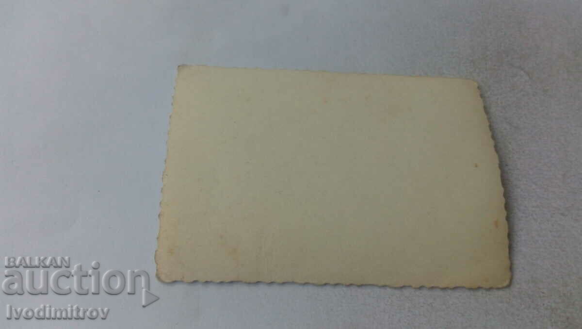 Photo Men and women next to a newly constructed building with price 1.15 BGN | € 0.59 Photo Men and women next to a newly constructed building with price 1.15 BGN | € 0.59