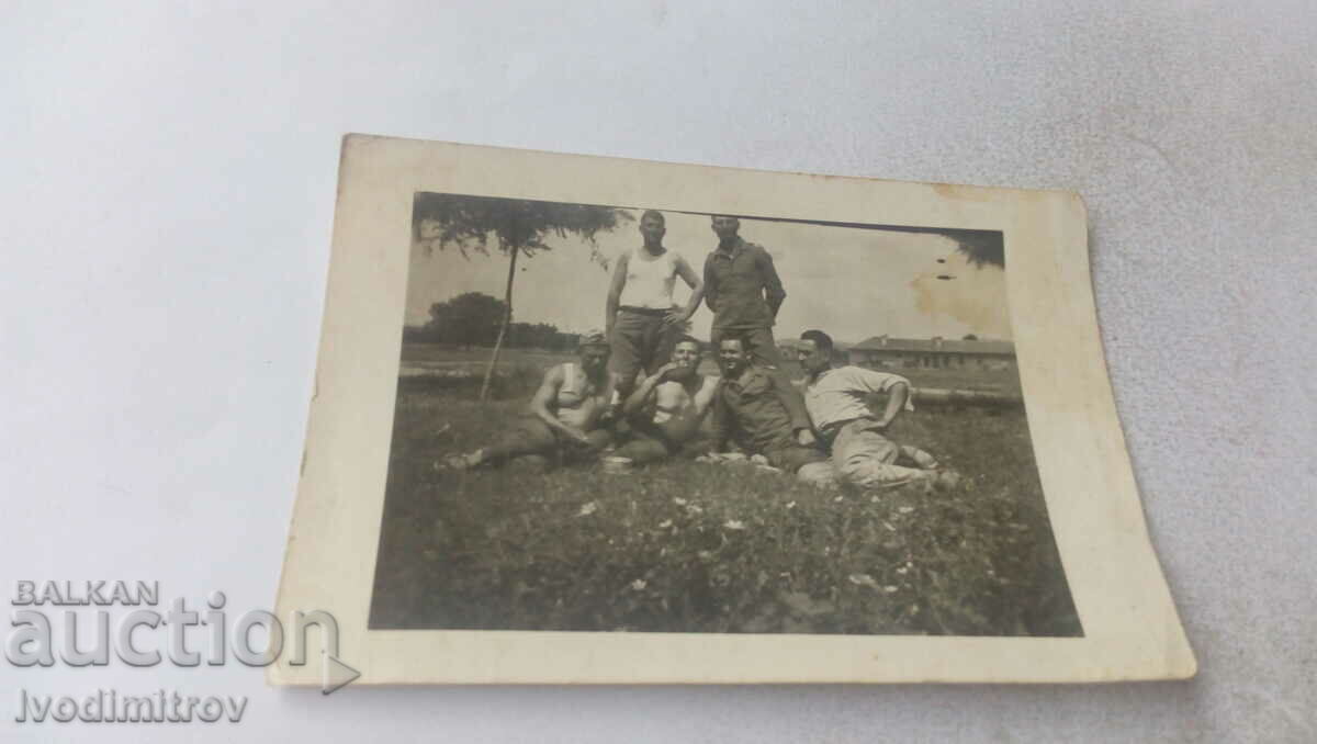 Photo Six soldiers on the meadow