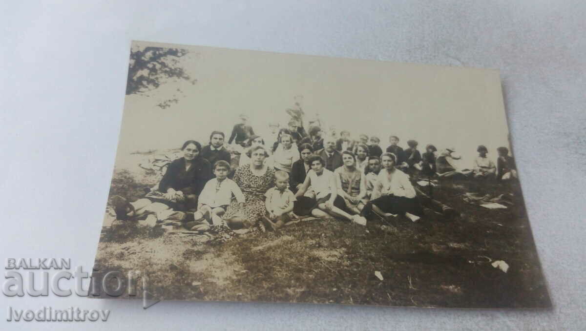 Photo Women and children on the meadow