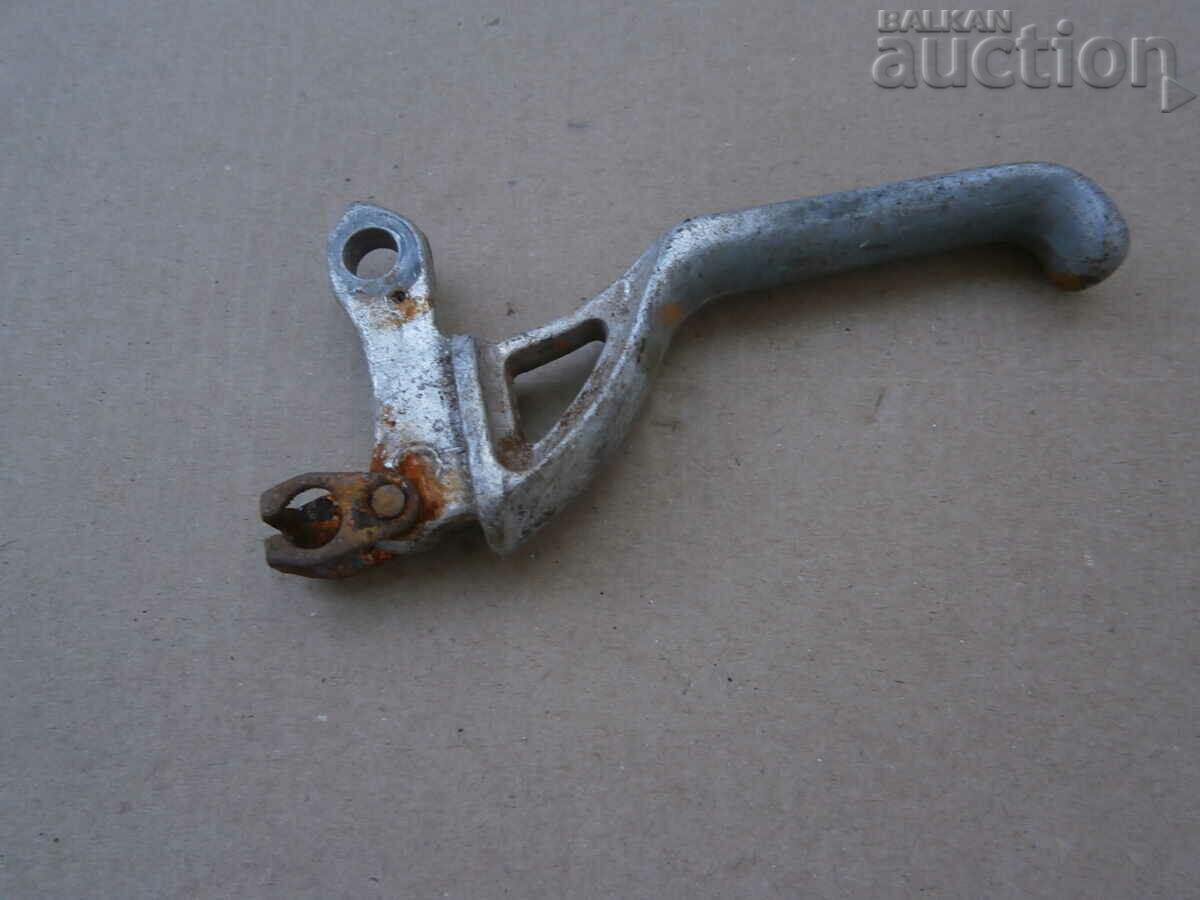 Delivery of vintage brake hand lever from a moped motor Delivery of vintage brake hand lever from a moped motor