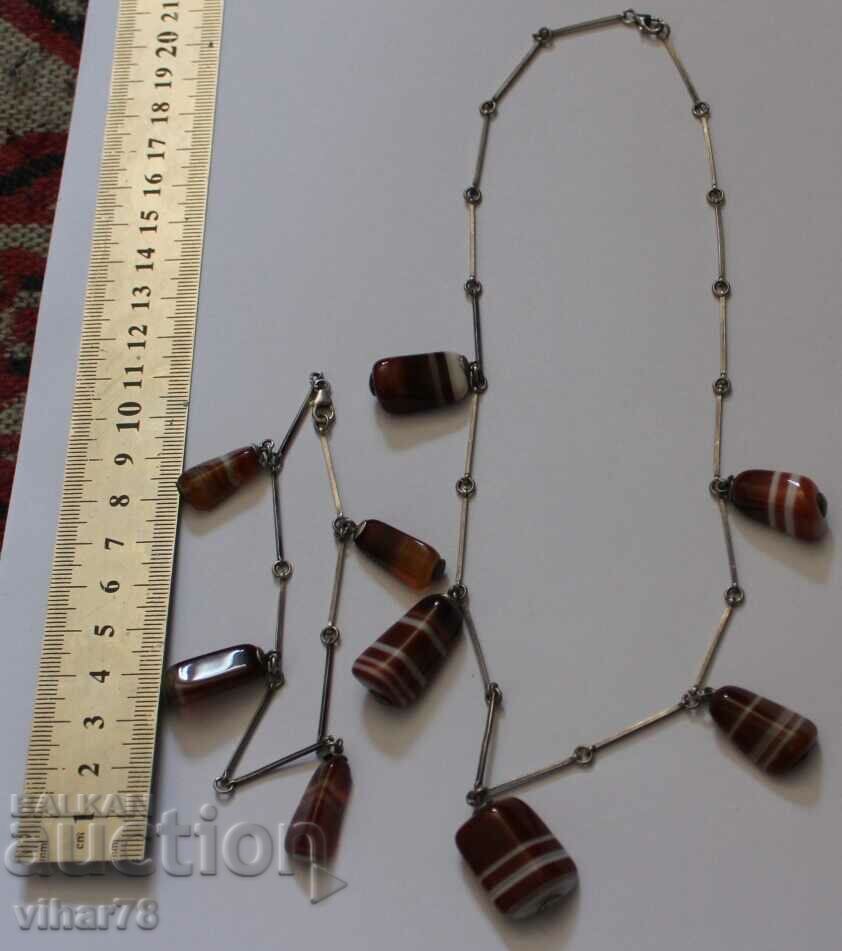 Delivery of SILVER NECKLACE AND BRACELET WITH CHARMS Delivery of SILVER NECKLACE AND BRACELET WITH CHARMS