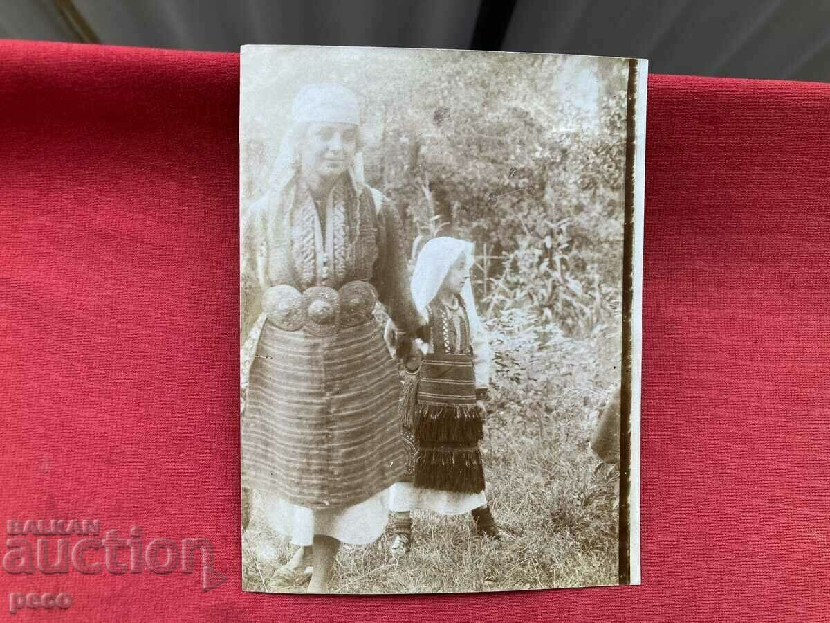 Woman and child in Macedonian costumes old photo circa 1910.