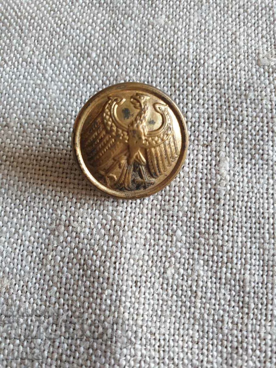Old military button with gilding