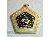 Medal sign "Winner" cyclist, bicycle, wheel - Belgium