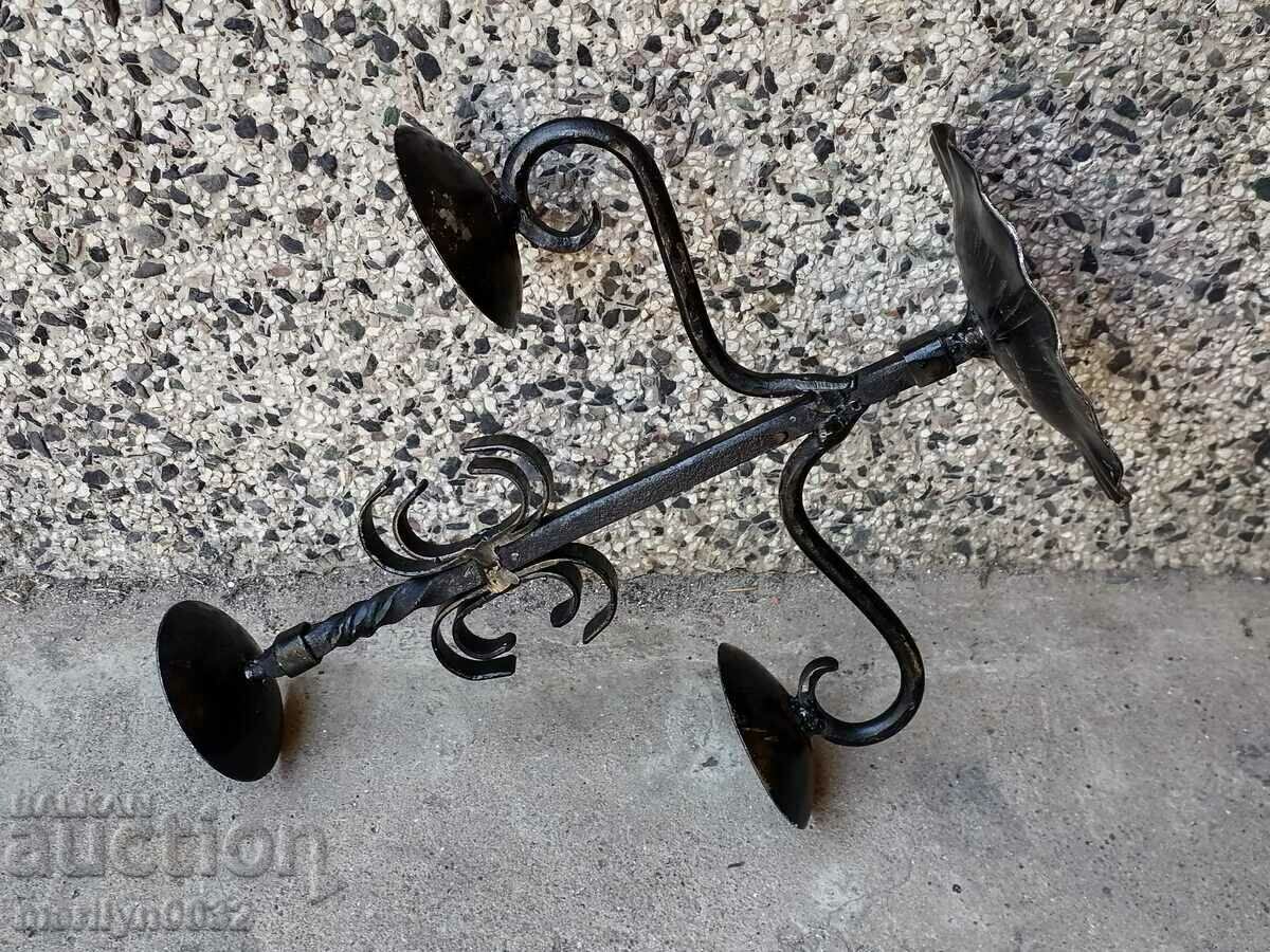 Delivery of An old candle made of wrought iron lamp Delivery of An old candle made of wrought iron lamp