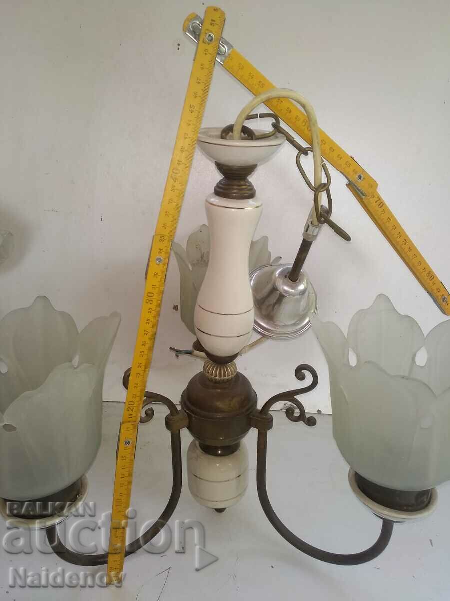 Old bronze chandelier with porcelain