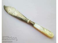 A beautiful old dining knife with engravings and mother-of-pearl handle 19c