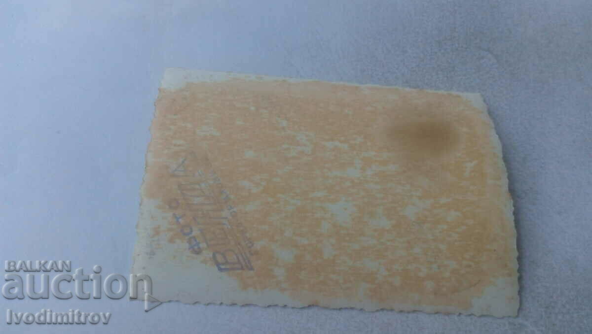 Photo Four young girls in folk costumes on the balcony with price 1.65 BGN | € 0.84