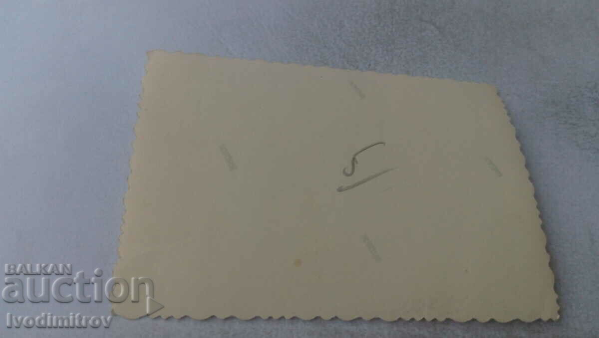 Photo Officer with his fiancee with lit candles and friends with price 2.15 BGN | € 1.10 Photo Officer with his fiancee with lit candles and friends with price 2.15 BGN | € 1.10