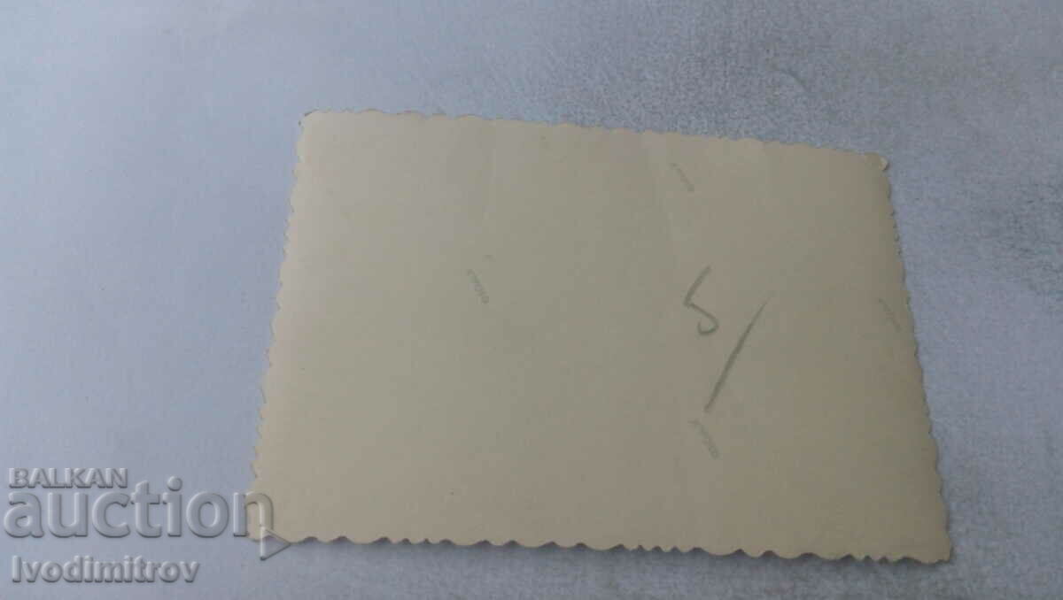 Photo Officer with his fiancee with lit candles and friends with price 2.15 BGN | € 1.10 Photo Officer with his fiancee with lit candles and friends with price 2.15 BGN | € 1.10