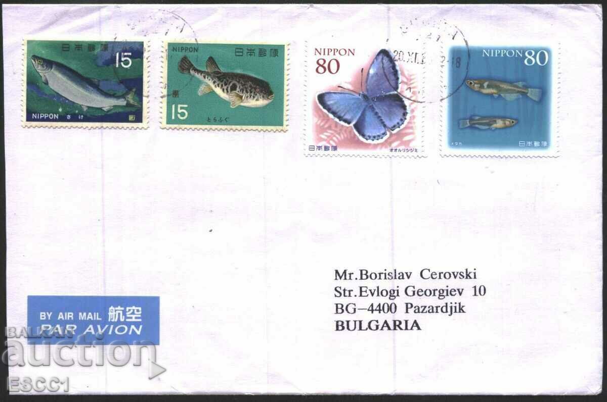 Traveled envelope with stamps Fauna Fishes, Butterflies from Japan