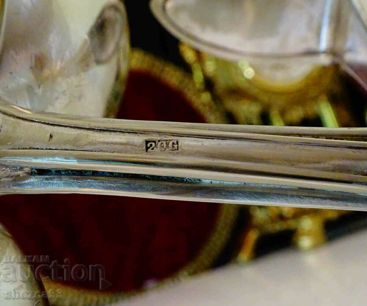 Auction  Silver-plated cocktail shaker, candle holder, ashtray, salt shaker