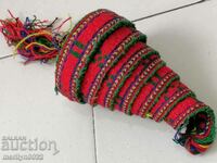 An old hand-woven belt from the beginning of the 20th century wears a length of 2.9 meters