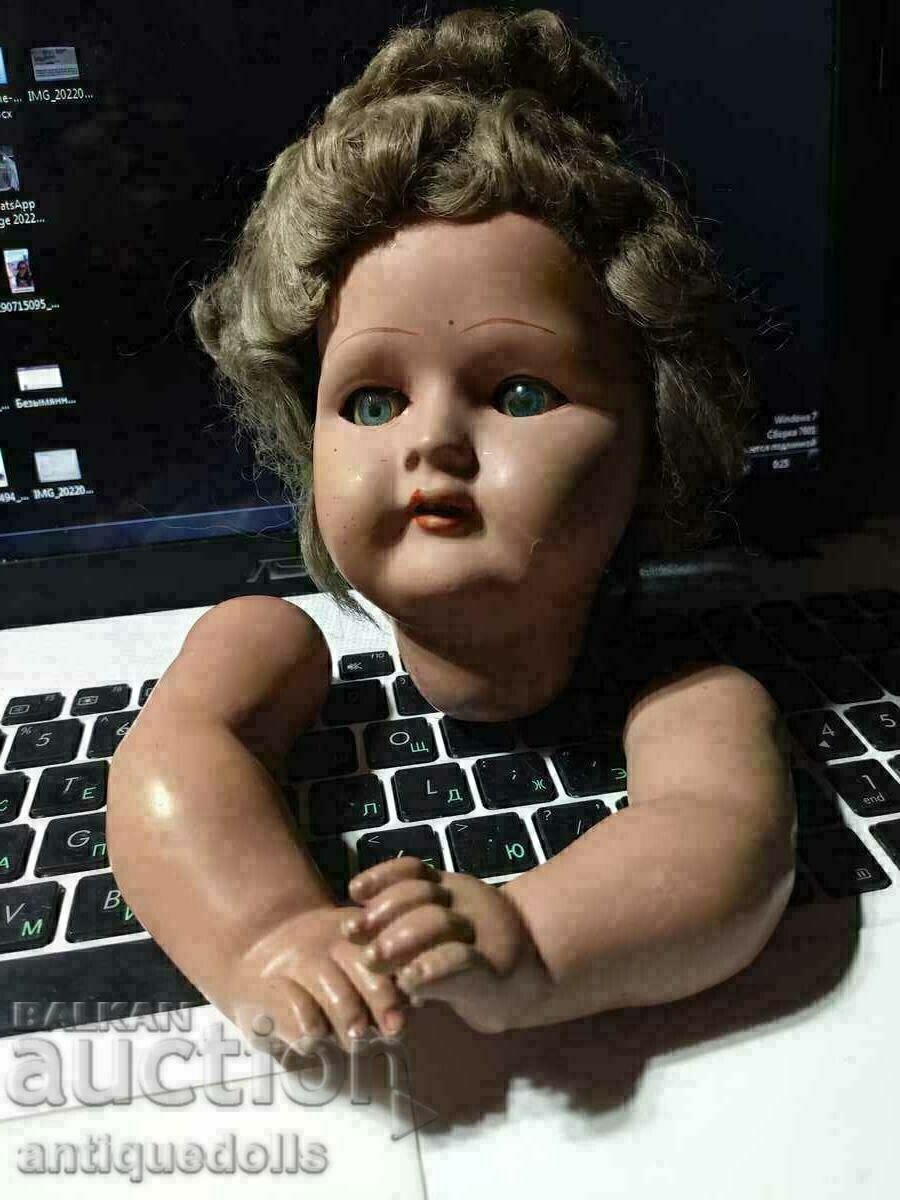 Antique French doll head and hands.