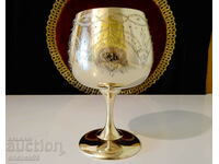 Engraved English goblet, glass, nickel silver.
