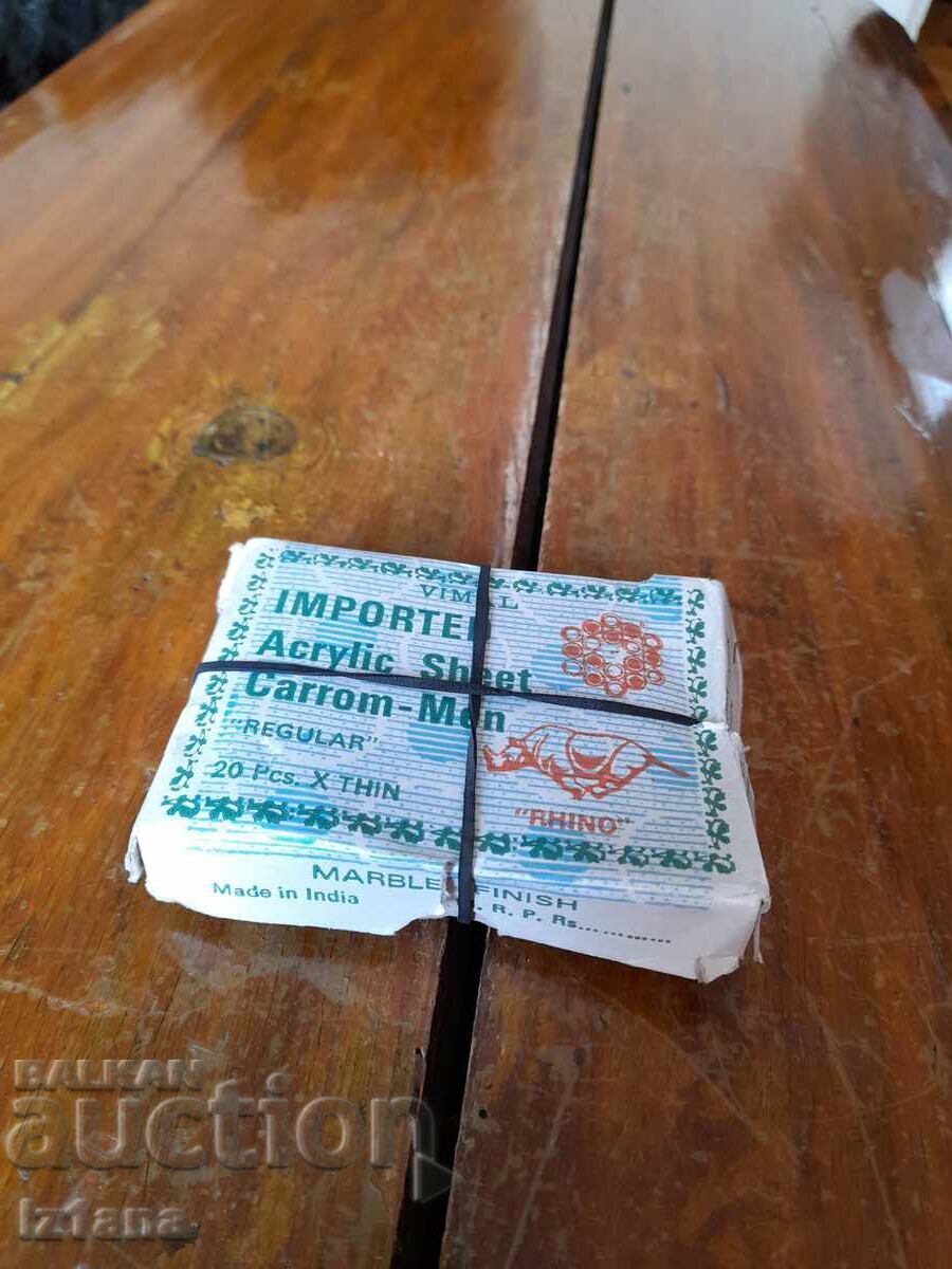 An old game of Carrom Men An old game of Carrom Men