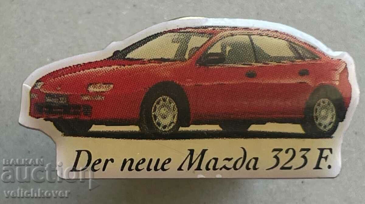 32999 Japan car badge Mazda model 323 F