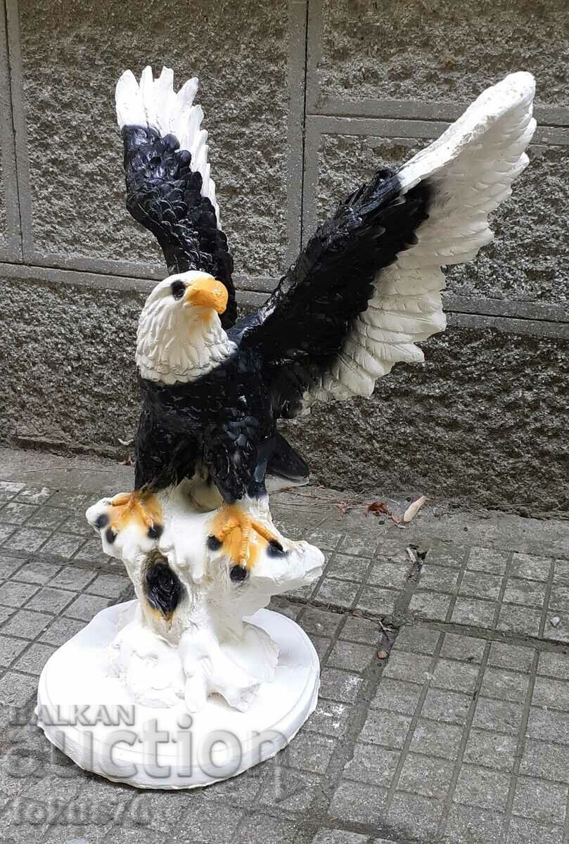 A very beautiful large colored eagle made of plaster